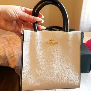 Coach mini leather Cali bag with flower mirror charm